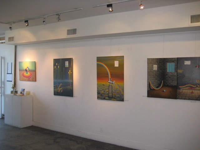 Paintings on display inside the gallery