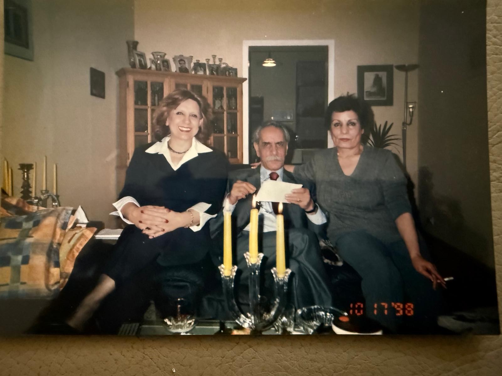 With his sisters, Fahimeh Azadi and Farideh Azadi